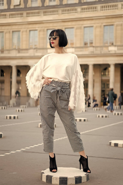 Girl pose on square in paris, france - 写真・画像