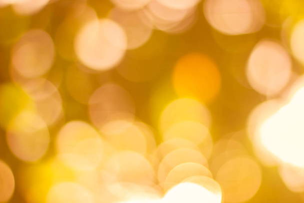 Abstract glamorous white silver and gold bokeh lights glitter sparkle. Defocused background have luxury golden color party invite for birthday, anniversary, holliday, new year eve or christmas. - 写真・画像