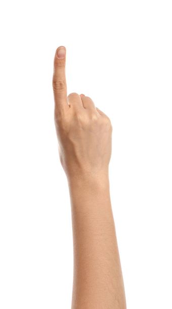 Mão feminina com dedo indicador levantado sobre fundo branco
 - Foto, Imagem