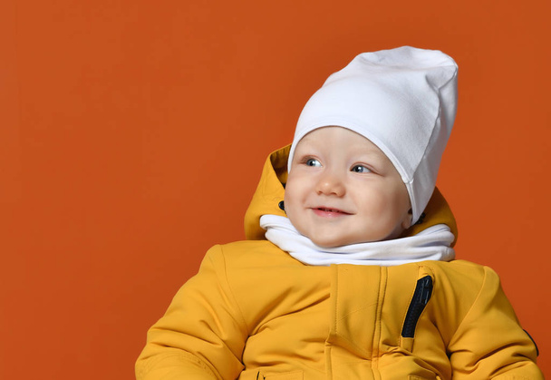 Children in winter clothes. Kids in down jackets. Fashion child - Фото, зображення