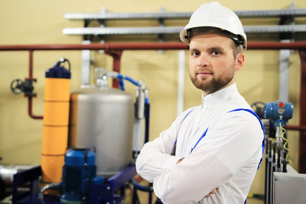 Portrait of industrial engineer on gas and oil plant - Фото, зображення