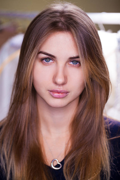 Portrait of a young serious woman without makeup  - Фото, зображення