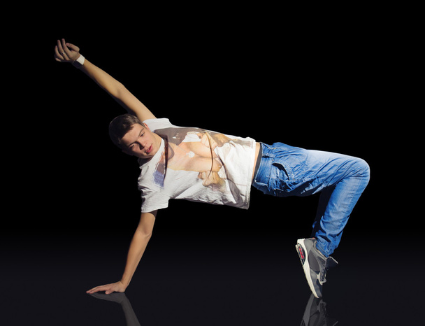 Young breakdancer on the floor - 写真・画像