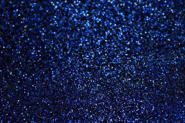 Темно-морський синій блискучий фон з маленьких блискіток, крупним планом. Блискучий блискучий фон з текстилю. Шіммер папір
 - Фото, зображення