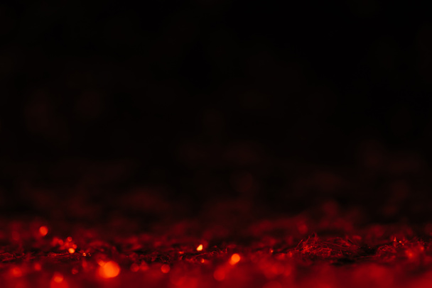 Red Defocused Glitter On Black Background With Free Stock Photo and Image
