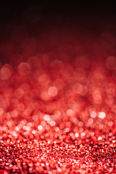 abstract christmas background with red defocused glitter  - Φωτογραφία, εικόνα
