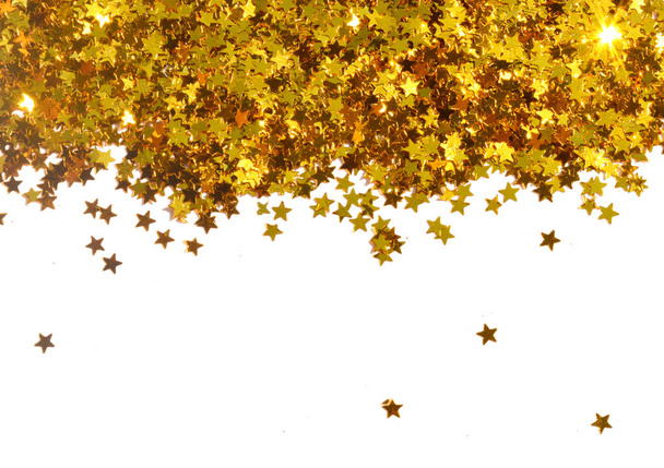 Estrellas doradas brillantes sobre fondo blanco
 - Foto, Imagen