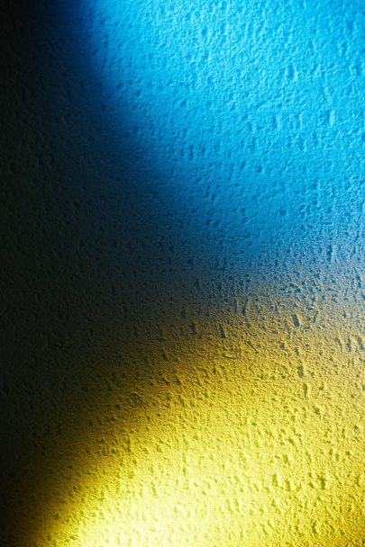 Blue and yellow glow on the background above and below - Photo, Image
