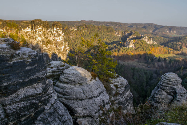 Elbe Sandstone Mountains in Saxon Switzerland National Park over the river Elbe. East Germany, Europe. Popular tourist attraction. Adventure vacation. European travel. - Photo, Image