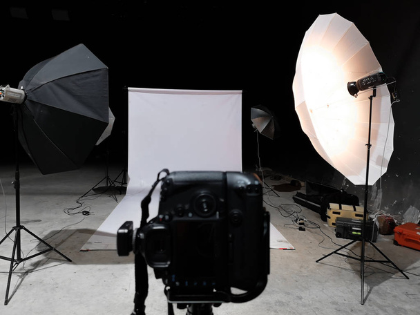 Lighting to shoot in the studio. There is a white scene in the black room. - Photo, Image