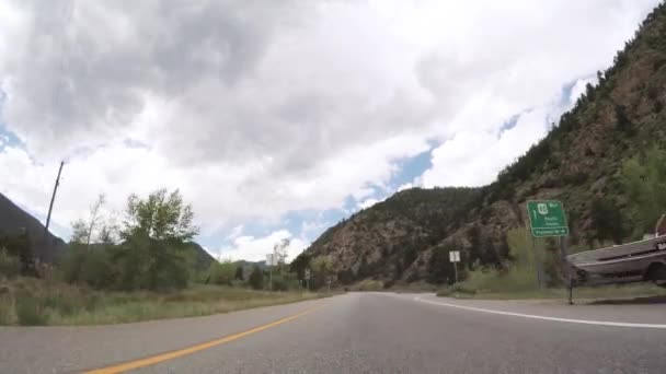 Driving on mountain highway 40 over Berthoud Pass in the Summer. - Video, Çekim