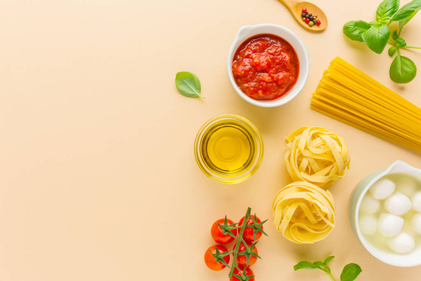 top view of fresh Italian pasta Ingredients on bright background - Φωτογραφία, εικόνα