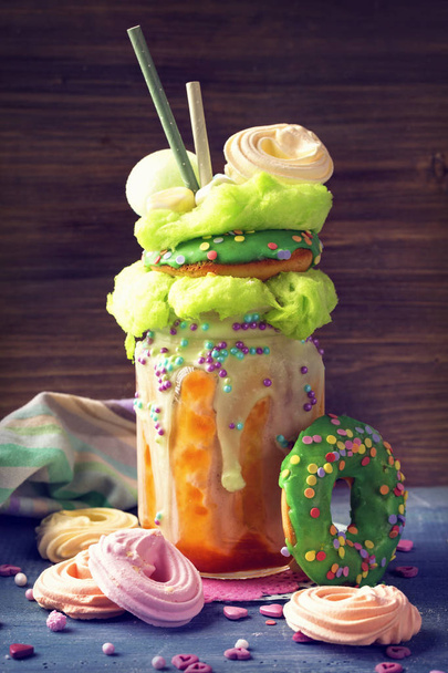 Apricot freakshake with donut and candy floss - Zdjęcie, obraz