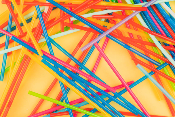 Drinking straws for colored background. Colorful plastic straws used for drinking water or soft drinks - Valokuva, kuva