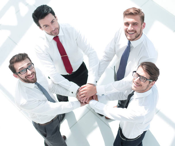 top view. business team putting their hands together - Φωτογραφία, εικόνα
