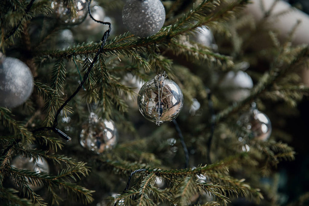 Decoration balls on a Christmas tree in loft - Fotoğraf, Görsel
