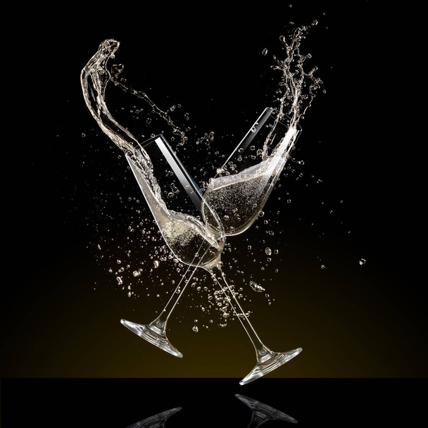 Glasses of champagne levitating in the air, celebration theme. - Fotó, kép
