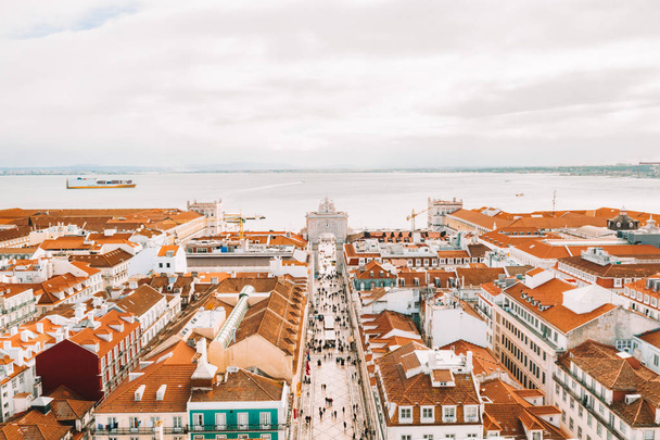 Aerial view of the Lisbon old town center with main street going straight to the Commerce square by the bay. - Foto, Imagen