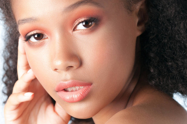 Young beautiful black girl with clean perfect skin close-up. Beauty portrait - Foto, Imagem