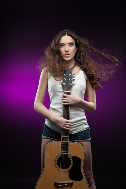 sexy girl holding guitar - Фото, зображення