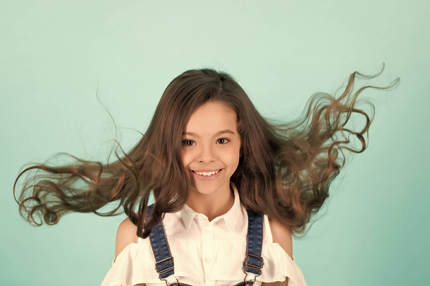 Girl with blowing long healthy brunette hair - Zdjęcie, obraz