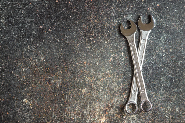 Chrome vanadium wrench. Industrial spanner on old table. - Fotografie, Obrázek