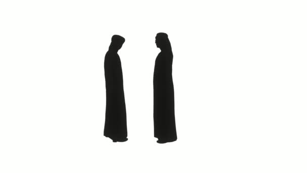 Le silhouette di due arabi in dishdasha stanno parlando tra loro
. - Filmati, video