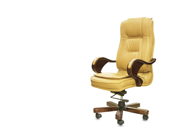 The office chair from yellow leather. Isolated - 写真・画像