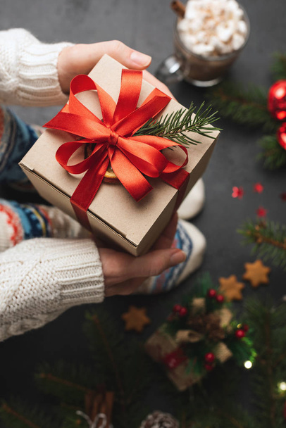 Person holding Christmas present gift box - Photo, Image