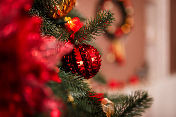 Christmas Balls And Decorations On A Beautiful Christmas Tree. Decorated New Year's Interior. Place For Text. - Fotó, kép