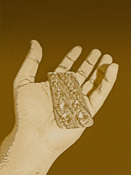 Csomag tabletták, tabletta gyógyszert emberi kéz - Fotó, kép