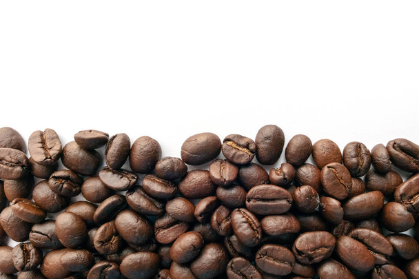 Roasted coffee beans for background. Close up. - Foto, afbeelding