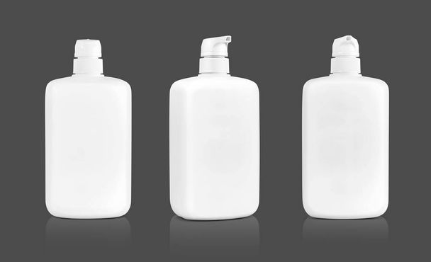 blank packaging white cosmetic cream pumping bottle isolated on gray background with clipping path ready for product design - Foto, Bild