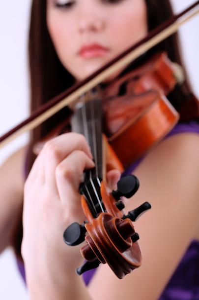 Beautiful young girl with violin, close up - Fotó, kép