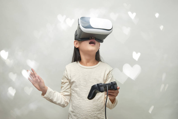 Smiling girl with glasses of virtual reality - Photo, Image
