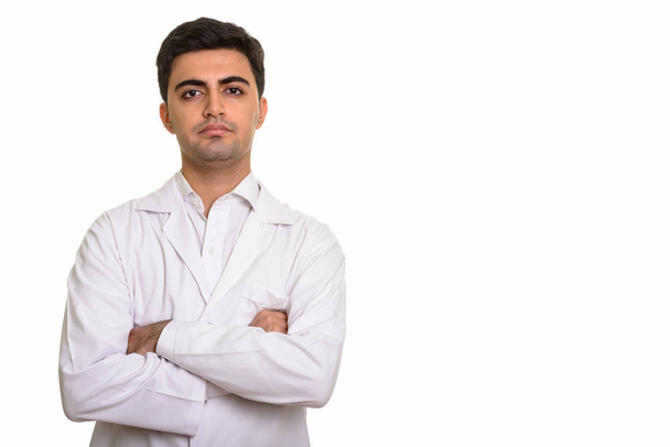 Joven guapo médico persa con los brazos cruzados
 - Foto, imagen