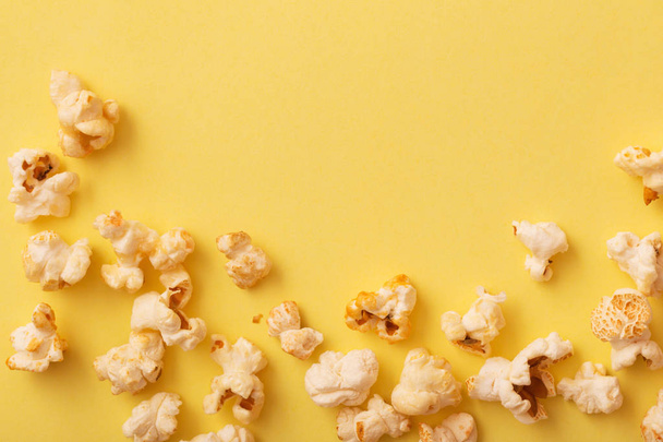 pop corn on yellow background - Photo, Image