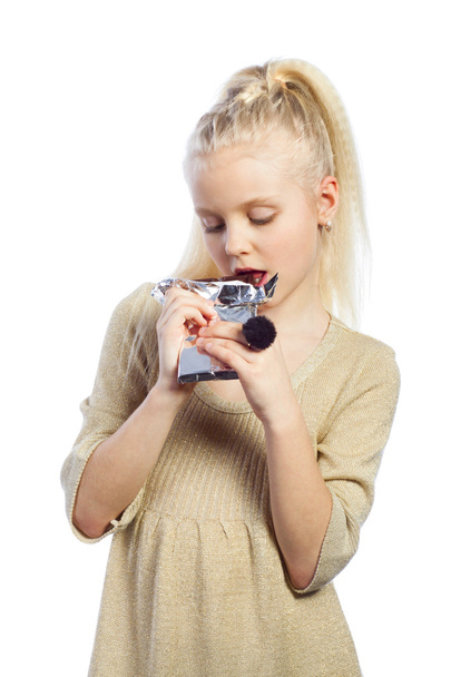 Beautiful girl biting chocolate. - Valokuva, kuva