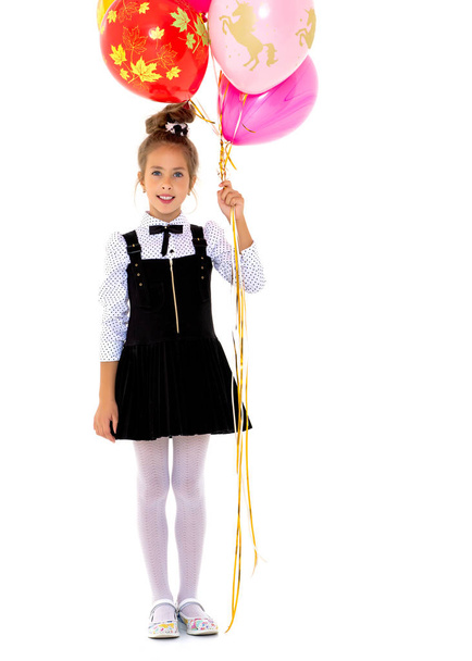 Little girl with helium balloons. - Valokuva, kuva