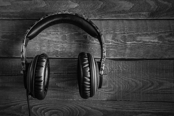 studio headphones on a dark wooden background - Photo, Image