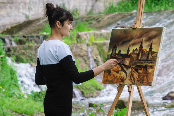 The artist paints a fortress at work. which is located on the territory of Ukraine - Photo, Image