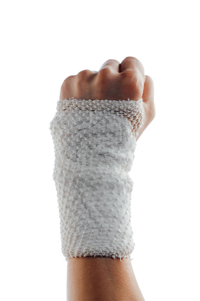 wrist wrapped with healing bandage, isolated on white - Photo, Image
