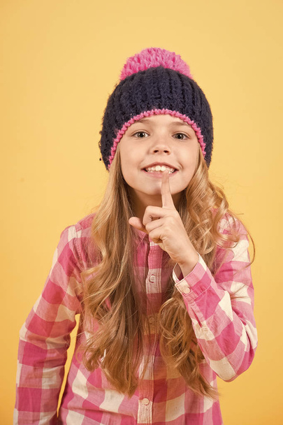 Girl in hat, plaid shirt smile on orange background - Photo, Image