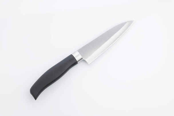 Кухня: Top View of Kitchen Knife with Stainless Steel Blade on White Background
 - Фото, изображение