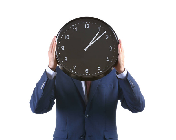 Businessman with clock on white background - Photo, Image