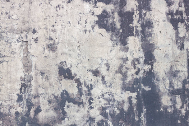 Interessante achtergrond van gespikkelde betonnen wand, abstracte achtergrond en textuur. - Foto, afbeelding