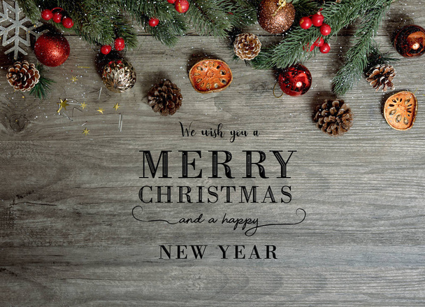 Merry Christmas text and gift box decoration on wood table background. copy space. - Photo, Image