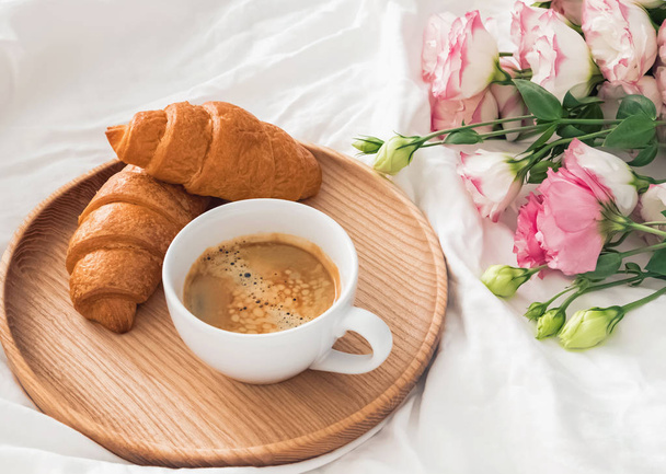 Breakfast in bed with coffee and croissants - Φωτογραφία, εικόνα
