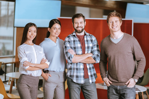 Joyful four colleagues beginning startup - Photo, image