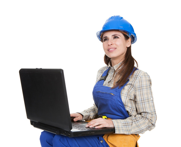 Female Worker Working On Laptop - Foto, imagen